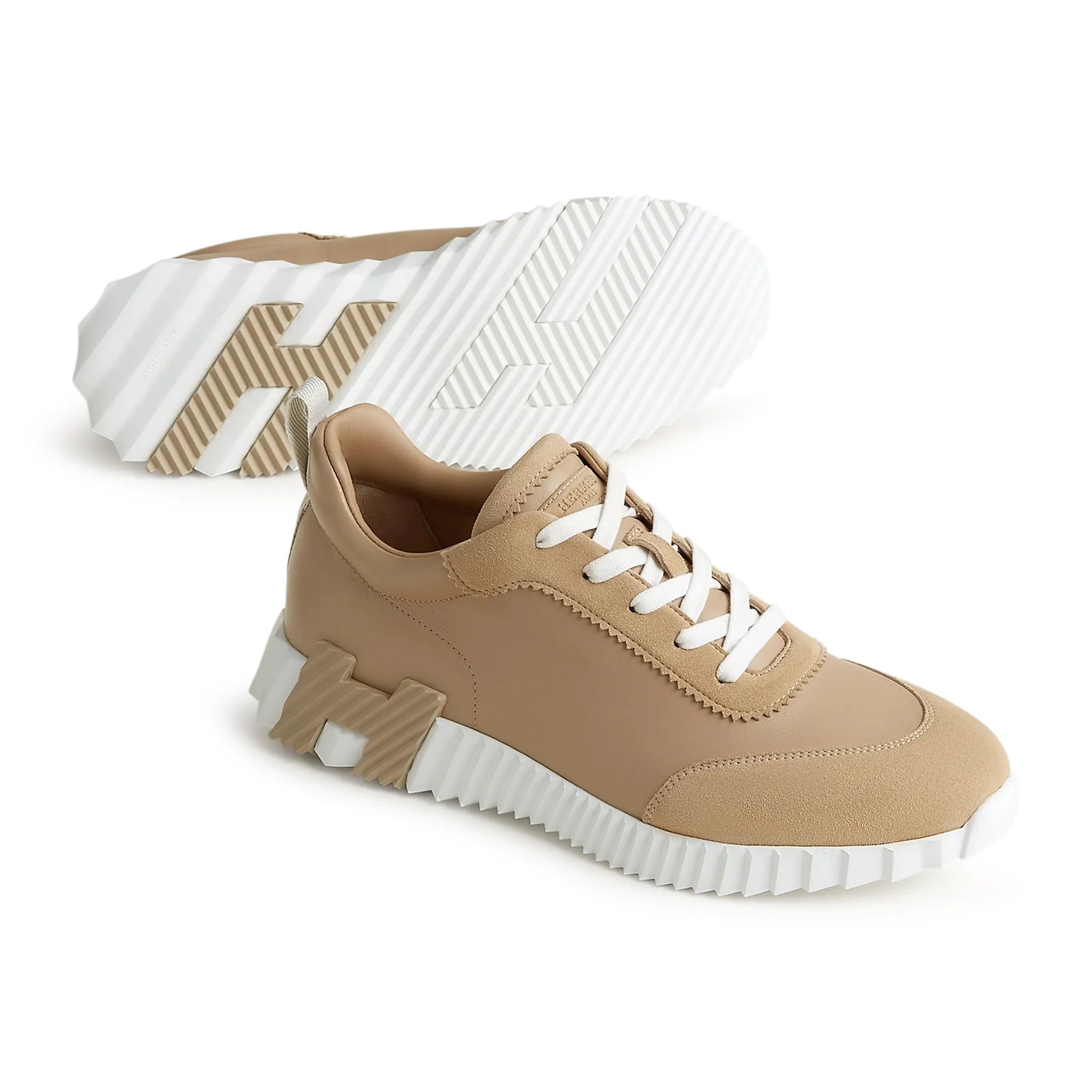 Sole view of Hermes Paris Bouncing Sneaker Beige Lin H221898ZH5K390